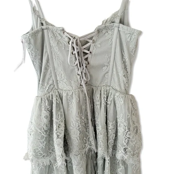 V. Chapman Mia Dress Sage Lace Tiered Midi Dress corset bustier Green Revolve 4 - Picture 10 of 10